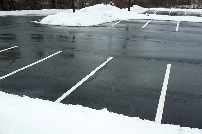 parking lot with snow plowed and cleared